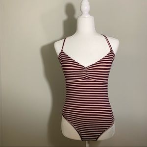 Ribbed knit bodysuit with overall striped pattern